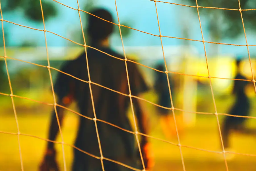 Football goal net at the moment of a shot